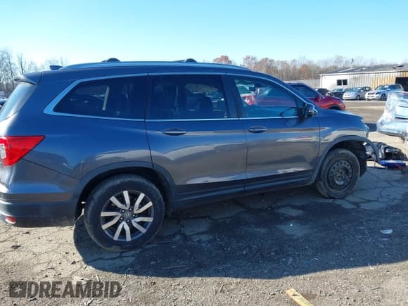 ✅ 2019 Honda Pilot EX-L • VIN: 5FNYF6H53KB052781 • Lot: 43778126. Wystawiony na IAAI z przebiegiem 154 846 mil. Bezpłatny archiwum sprzedaży aukcyjnych z USA i szczegółowy raport historii pojazdu na DreamBid. Zdjęcie 14.