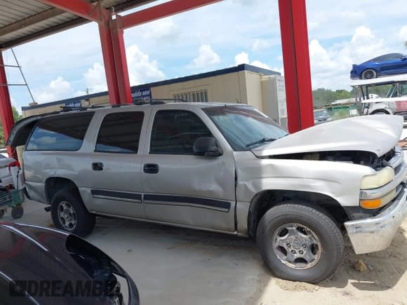 ✅ 2005 Chevrolet Suburban LT • VIN: 3GNEC16Z25G132924 • Lot: 42540387. Listed on IAAI with 336,563 mi. Free auction sales archive from the USA and detailed vehicle history report at DreamBid. Image 13.