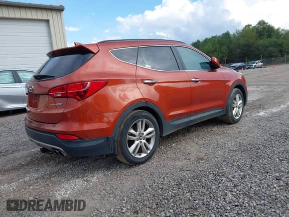 2013 Hyundai Santa Fe Sport z VIN 5XYZU3LA1DG106555, wystawiony jako IAAI lot #43211750 z przebiegiem 176 323 mil mil oraz . Historia ofert i sprzedaży dostępna na DreamBid. Obrazek 4.