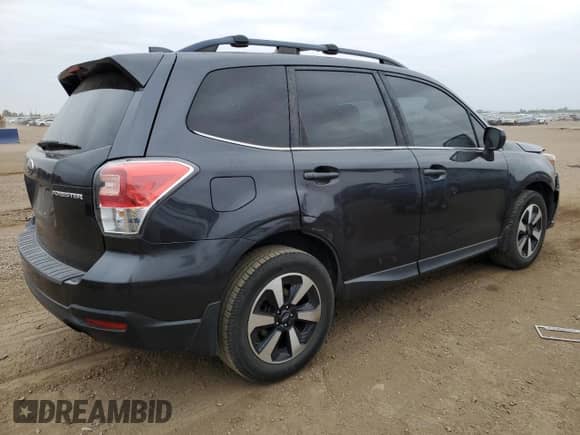 2018 Subaru Forester Limited с VIN JF2SJAJC1JH514206, выставлен на аукционе Copart как лот 71266565 с пробегом 91 863 миль миль и Списание • Salvage title. История ставок и продаж доступна на DreamBid. Изображение 3.