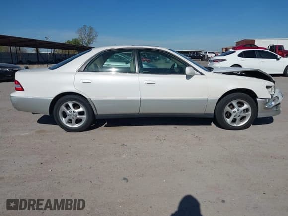 ✅ 2000 Lexus ES 300 • VIN: JT8BF28G4Y5102497 • Лот: 43650282. Опубликован ранее на IAAI с пробегом 128 348 миль. Бесплатный доступ к архиву аукционных продаж из США и подробный отчёт об истории автомобиля на DreamBid. Изображение 13.