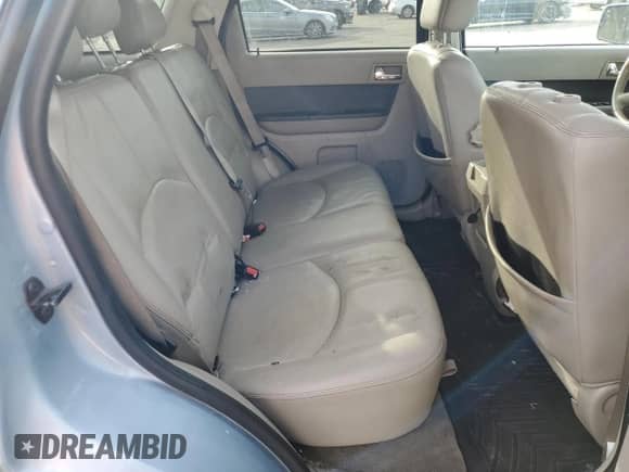 2009 Mercury Mariner Premier with VIN 4M2CU97719KJ17381, listed as a Copart auction lot 80750244 with 115,730 mi miles and Salvage title. Bid and sale history available at DreamBid. Image 11.