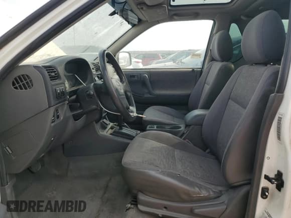 ✅ 2002 Isuzu Rodeo • VIN: 4S2CM57W824306193 • Lot: 71933395. Listed on Copart with 216,462 mi. Free auction sales archive from the USA and detailed vehicle history report at DreamBid. Image 7.