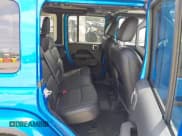 ✅ 2023 Jeep Wrangler Sahara • VIN: 1C4HJXEG4PW584800 • Lot: 41908392. Listed on IAAI with 22,108 mi. Free auction sales archive from the USA and detailed vehicle history report at DreamBid. Image 8.