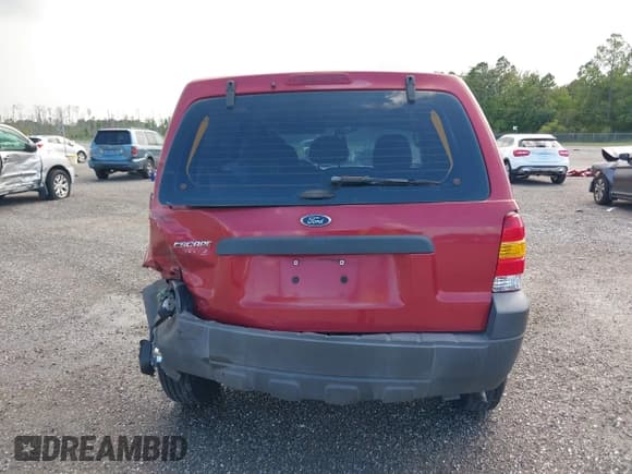 ✅ 2006 Ford Escape XLS • VIN: 1FMYU02ZX6KC27594 • Lot: 41162362. Listed on IAAI with 73,444 mi. Free auction sales archive from the USA and detailed vehicle history report at DreamBid. Image 15.
