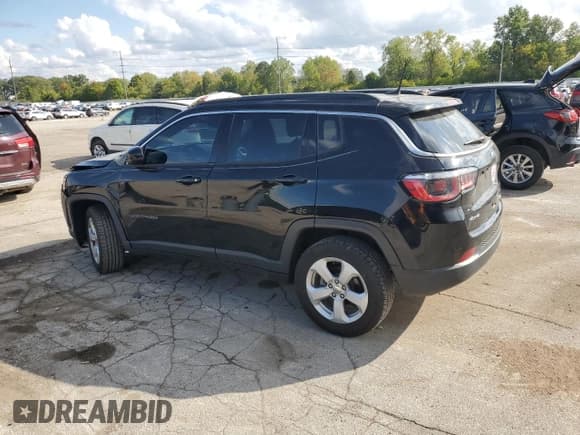 ✅ 2018 Jeep Compass Latitude • VIN: 3C4NJDBB6JT143080 • Lot: 81753445. Listed on Copart with 114,588 mi. Free auction sales archive from the USA and detailed vehicle history report at DreamBid. Image 2.