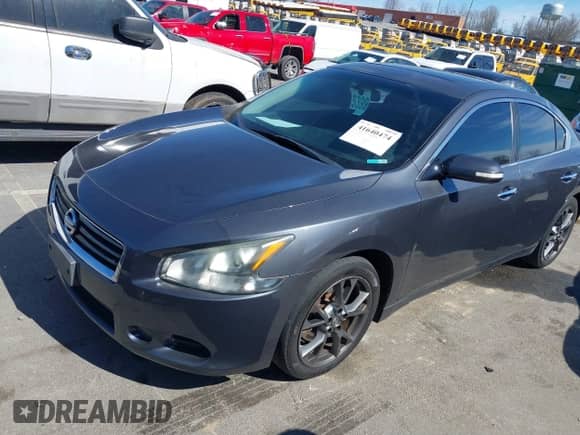 2012 Nissan Maxima S z VIN 1N4AA5APXCC821884, wystawiony jako IAAI lot #41640474 z przebiegiem 185 732 mil mil oraz . Historia ofert i sprzedaży dostępna na DreamBid. Obrazek 2.