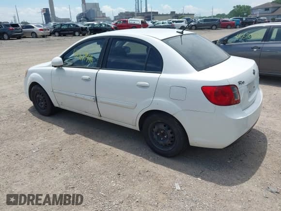 ✅ 2011 Kia Rio LX • VIN: KNADH4A32B6923846 • Lot: 42619416. Wystawiony na IAAI z przebiegiem 155 734 mil. Bezpłatny archiwum sprzedaży aukcyjnych z USA i szczegółowy raport historii pojazdu na DreamBid. Zdjęcie 3.