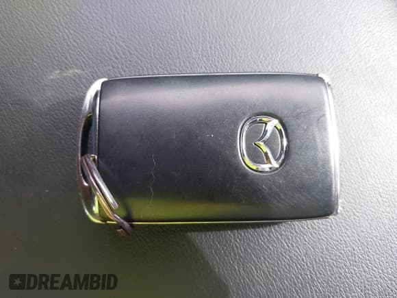 ✅ 2024 Mazda 3 S Carbon Edition • VIN: JM1BPBLM0R1656012 • Лот: 43073743. Опубликован ранее на IAAI с пробегом 21 302 миль. Бесплатный доступ к архиву аукционных продаж из США и подробный отчёт об истории автомобиля на DreamBid. Изображение 11.