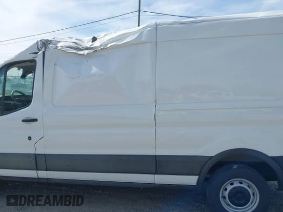 ✅ 2024 Ford Transit Cargo • VIN: 1FTBR1C8XRKA46961 • Lot: 41823255. Listed on IAAI with 4,292 mi. Free auction sales archive from the USA and detailed vehicle history report at DreamBid. Image 15.
