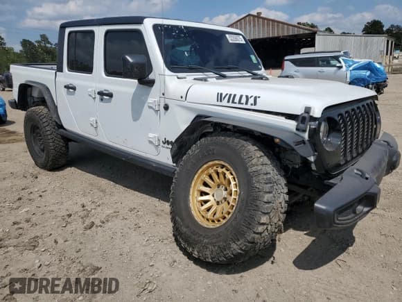 ✅ 2022 Jeep Gladiator Willys Sport • VIN: 1C6HJTAG3NL108428 • Lot: 53356875. Listed on Copart with 55,054 mi. Free auction sales archive from the USA and detailed vehicle history report at DreamBid. Image 4.