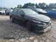 2021 Toyota Camry Hybrid LE with VIN 4T1C31AK3MU554394, listed as a IAAI auction lot 42868308 with 97,957 mi miles and . Bid and sale history available at DreamBid. Image 1.