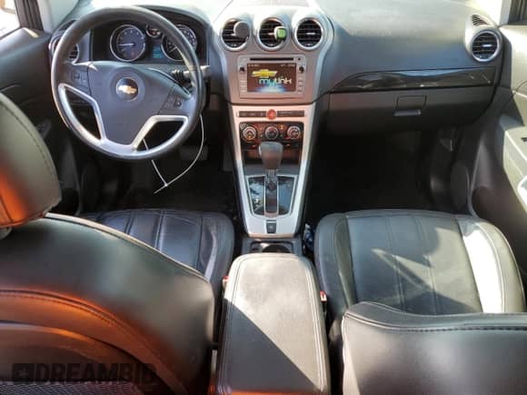 2014 Chevrolet Captiva Sport LTZ с VIN 3GNAL4EK8ES566461, выставлен на аукционе Copart как лот 76075194 с пробегом 92 342 миль миль и Списание • Salvage title. История ставок и продаж доступна на DreamBid. Изображение 8.