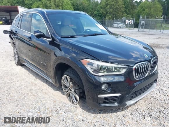 ✅ 2016 BMW X1 xDrive28i • VIN: WBXHT3C32G5E50186 • Lot: 43220255. Listed on IAAI with 72,024 mi. Free auction sales archive from the USA and detailed vehicle history report at DreamBid. Image 1.