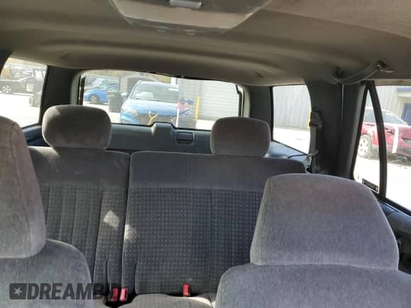 2002 Chevrolet Blazer LS z VIN 1GNDT13W42K241542, wystawiony jako Copart lot #77425714 z przebiegiem 171 055 mil mil oraz Szkoda całkowita • Salvage title. Historia ofert i sprzedaży dostępna na DreamBid. Obrazek 10.