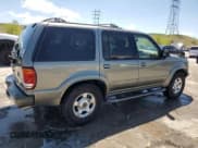 ✅ 1999 Ford Explorer XLT • VIN: 1FMDU32P2XZB63770 • Lot: 56206075. Listed on Copart with 110,249 mi. Free auction sales archive from the USA and detailed vehicle history report at DreamBid. Image 3.