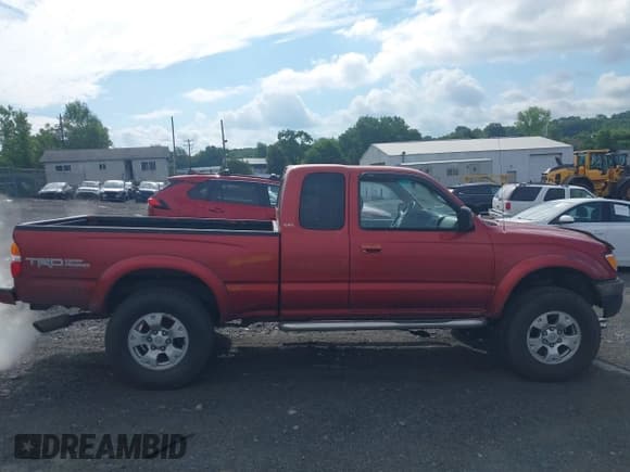 ✅ 2002 Toyota Tacoma • VIN: 5TEWN72N12Z016370 • Lot: 42610257. Listed on IAAI with 229,226 mi. Free auction sales archive from the USA and detailed vehicle history report at DreamBid. Image 13.