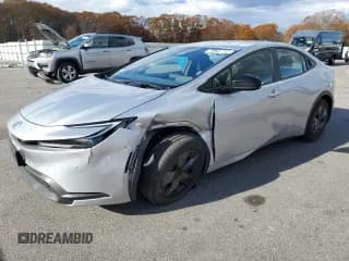 ✅ 2025 Toyota Prius LE • VIN: JTDACAAU9S3050285 • Лот: 91718525. Опубликован ранее на Copart с пробегом 15 786 миль. Бесплатный доступ к архиву аукционных продаж из США и подробный отчёт об истории автомобиля на DreamBid. Изображение 1.