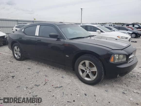 2009 Dodge Charger SXT z VIN 2B3KA33V19H552986, wystawiony jako Copart lot #68633344 z przebiegiem 250 419 mil mil oraz Szkoda całkowita • Salvage title. Historia ofert i sprzedaży dostępna na DreamBid. Obrazek 4.