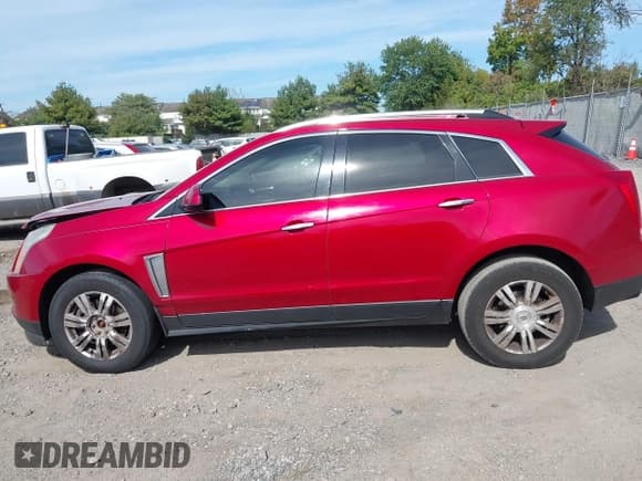 ✅ 2016 Cadillac SRX Luxury Collection • VIN: 3GYFNBE34GS562880 • Lot: 43370945. Wystawiony na IAAI z przebiegiem 128 891 mil. Bezpłatny archiwum sprzedaży aukcyjnych z USA i szczegółowy raport historii pojazdu na DreamBid. Zdjęcie 14.