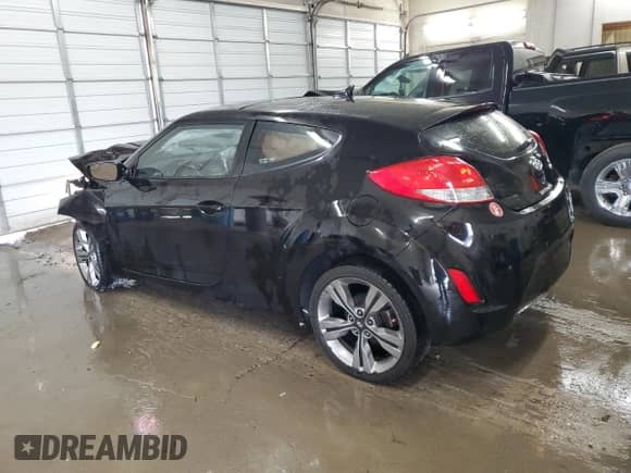 2014 Hyundai Veloster z VIN KMHTC6AD2EU208868, wystawiony jako Copart lot #65717864 z przebiegiem 150 225 mil mil oraz Szkoda całkowita • Salvage title. Historia ofert i sprzedaży dostępna na DreamBid. Obrazek 2.
