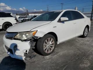 ✅ 2012 Toyota Camry XLE • VIN: 4T1BD1FKXCU055530 • Lot: 82127285. Wystawiony na Copart z przebiegiem 153 740 mil. Bezpłatny archiwum sprzedaży aukcyjnych z USA i szczegółowy raport historii pojazdu na DreamBid. Zdjęcie 1.