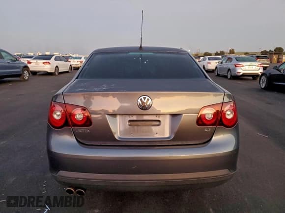 ✅ 2009 Volkswagen Jetta S • VIN: 3VWJZ71K29M019885 • Lot: 94556905. Listed on Copart with 127,645 mi. Free auction sales archive from the USA and detailed vehicle history report at DreamBid. Image 6.