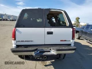 ✅ 1997 GMC Suburban • VIN: 3GKFK16R1VG507044 • Лот: 87302674. Опубликован ранее на Copart с пробегом 193 670 миль. Бесплатный доступ к архиву аукционных продаж из США и подробный отчёт об истории автомобиля на DreamBid. Изображение 6.