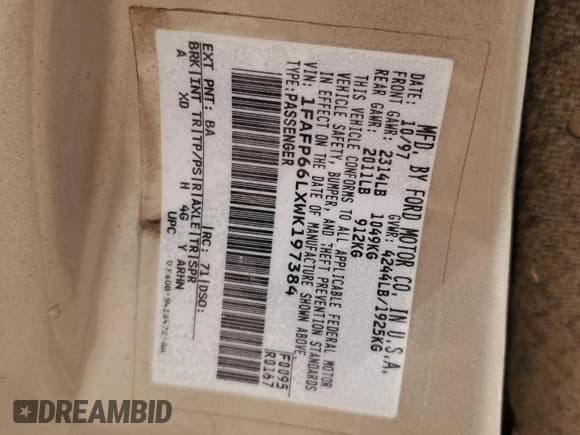 ✅ 1998 Ford Contour LX • VIN: 1FAFP66LXWK197384 • Lot: 51519385. Listed on Copart with 56,958 mi. Free auction sales archive from the USA and detailed vehicle history report at DreamBid. Image 12.