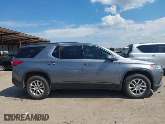 ✅ 2019 Chevrolet Traverse LT Cloth • VIN: 1GNERGKW2KJ258790 • Lot: 43320708. Wystawiony na IAAI z przebiegiem 123 720 mil. Bezpłatny archiwum sprzedaży aukcyjnych z USA i szczegółowy raport historii pojazdu na DreamBid. Zdjęcie 13.