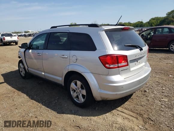 ✅ 2013 Dodge Journey SE • VIN: 3C4PDCAB1DT555262 • Lot: 70923105. Listed on Copart with 186,222 mi. Free auction sales archive from the USA and detailed vehicle history report at DreamBid. Image 2.