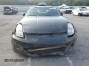 ✅ 2004 Nissan 350Z Enthusiast • VIN: JN1AZ34D24T150448 • Lot: 71831135. Wystawiony na Copart z przebiegiem 148 647 mil. Bezpłatny archiwum sprzedaży aukcyjnych z USA i szczegółowy raport historii pojazdu na DreamBid. Zdjęcie 5.