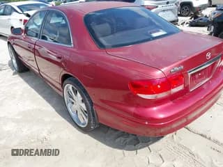 ✅ 2001 Mazda Millenia • VIN: JM1TA221911707878 • Lot: 42441666. Wystawiony na IAAI z przebiegiem 103 196 mil. Bezpłatny archiwum sprzedaży aukcyjnych z USA i szczegółowy raport historii pojazdu na DreamBid. Zdjęcie 3.