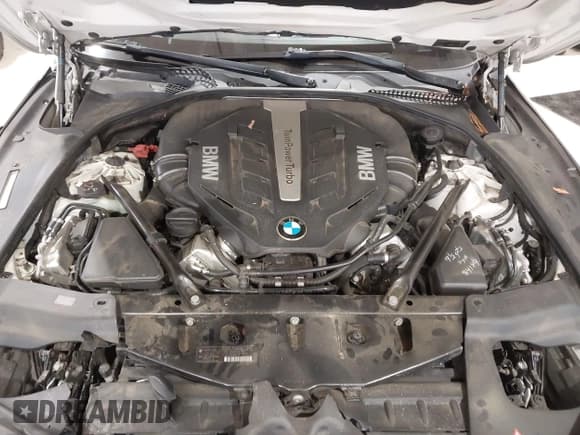 ✅ 2014 BMW 6 Series 650i • VIN: WBA6B2C58ED129009 • Lot: 43546135. Listed on IAAI with 123,509 mi. Free auction sales archive from the USA and detailed vehicle history report at DreamBid. Image 10.