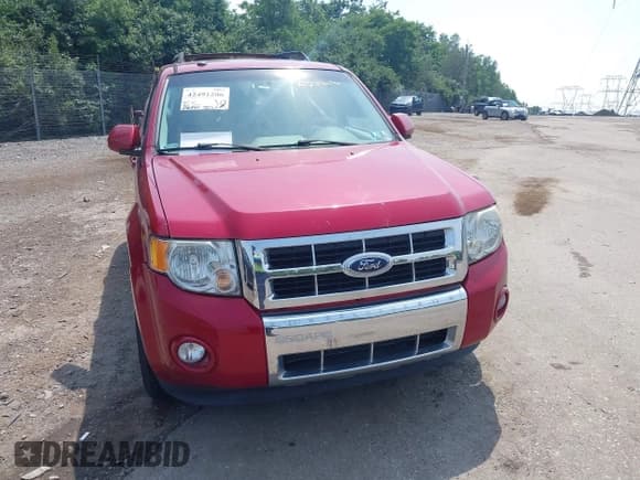 ✅ 2010 Ford Escape Limited • VIN: 1FMCU0E74AKA03606 • Lot: 42491206. Listed on IAAI with 106,749 mi. Free auction sales archive from the USA and detailed vehicle history report at DreamBid. Image 6.