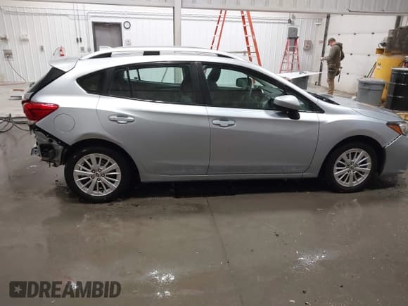 ✅ 2018 Subaru Impreza Premium • VIN: 4S3GTAB63J3728036 • Lot: 43662045. Listed on IAAI with 70,151 mi. Free auction sales archive from the USA and detailed vehicle history report at DreamBid. Image 14.