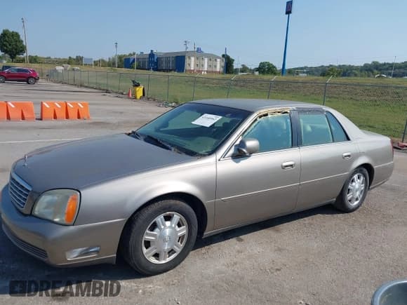 ✅ 2003 Cadillac DeVille • VIN: 1G6KD54Y43U151482 • Lot: 43140962. Wystawiony na IAAI z przebiegiem 101 641 mil. Bezpłatny archiwum sprzedaży aukcyjnych z USA i szczegółowy raport historii pojazdu na DreamBid. Zdjęcie 6.