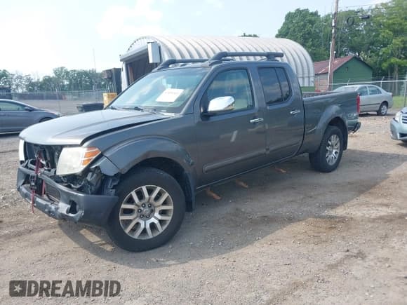 ✅ 2009 Nissan Frontier SE • VIN: 1N6AD09W19C407379 • Lot: 42494543. Listed on IAAI with 209,680 mi. Free auction sales archive from the USA and detailed vehicle history report at DreamBid. Image 2.