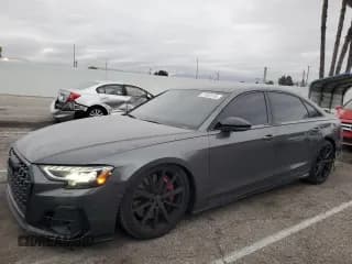 ✅ 2023 Audi S8 • VIN: WAULSAF83PN016195 • Лот: 51859105. Опубликован ранее на Copart с пробегом 16 492 миль. Бесплатный доступ к архиву аукционных продаж из США и подробный отчёт об истории автомобиля на DreamBid. Изображение 1.