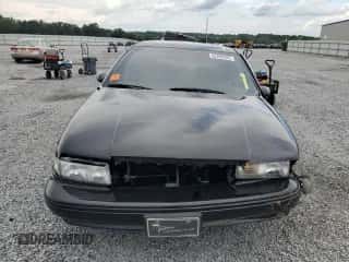 1994 Chevrolet Caprice LS z VIN 1G1BN52P6RR165392, wystawiony jako Copart lot #62899285 z przebiegiem 35 330 mil mil oraz Szkoda całkowita • Salvage title. Historia ofert i sprzedaży dostępna na DreamBid. Obrazek 5.