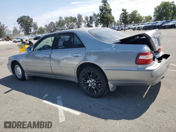 ✅ 2000 Infiniti Q45 • VIN: JNKBY31A8YM700930 • Лот: 81416685. Опубликован ранее на Copart с пробегом 194 798 миль. Бесплатный доступ к архиву аукционных продаж из США и подробный отчёт об истории автомобиля на DreamBid. Изображение 2.