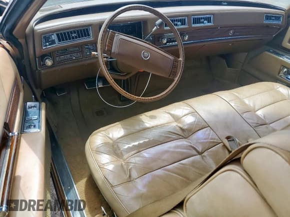 ✅ 1977 Cadillac Eldorado • VIN: 6L47S7Q330377 • Lot: 67294565. Listed on Copart with 33,183 mi. Free auction sales archive from the USA and detailed vehicle history report at DreamBid. Image 8.