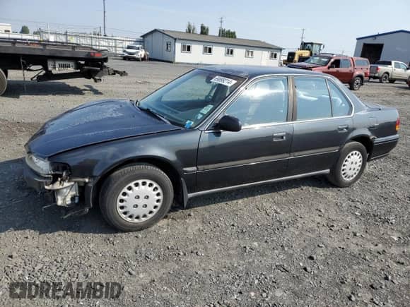 1993 Honda Accord LX with VIN 1HGCB755XPA191159, listed as a Copart auction lot 69899214 with 227,026 mi miles and Salvage title. Bid and sale history available at DreamBid. Image 1.