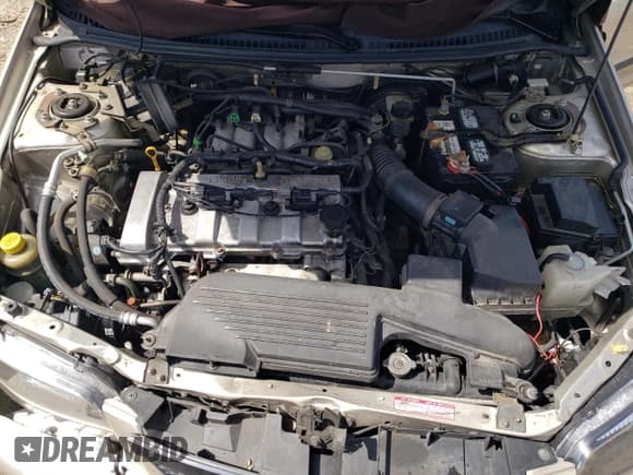 ✅ 2003 Mazda Protege DX • VIN: JM1BJ226730103729 • Lot: 63227285. Listed on Copart with 185,866 mi. Free auction sales archive from the USA and detailed vehicle history report at DreamBid. Image 11.