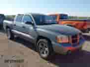 2007 Dodge Dakota SLT with VIN 1D7HW48K17S141534, listed as a IAAI auction lot 43202323 with 187,741 mi miles and . Bid and sale history available at DreamBid. Image 1.