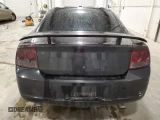 ✅ 2010 Dodge Charger SXT • VIN: 2B3CA3CV4AH210800 • Lot: 90127055. Wystawiony na Copart z przebiegiem 154 955 mil. Bezpłatny archiwum sprzedaży aukcyjnych z USA i szczegółowy raport historii pojazdu na DreamBid. Zdjęcie 6.