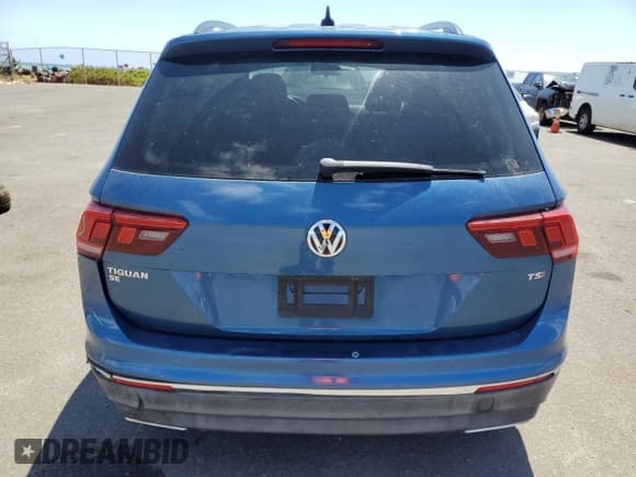 ✅ 2018 Volkswagen Tiguan SEL • VIN: 3VV3B7AX3JM021372 • Лот: 48673885. Опубликован ранее на Copart с пробегом 47 700 миль. Бесплатный доступ к архиву аукционных продаж из США и подробный отчёт об истории автомобиля на DreamBid. Изображение 6.