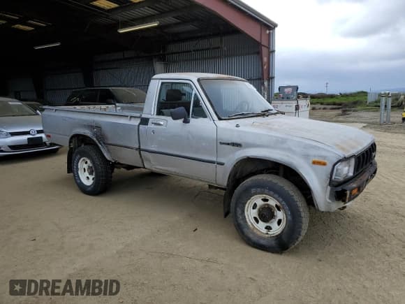 ✅ 1983 Toyota Pickup • VIN: JT4RN48S2D0070935 • Lot: 50933245. Listed on Copart with 50,699 mi. Free auction sales archive from the USA and detailed vehicle history report at DreamBid. Image 4.