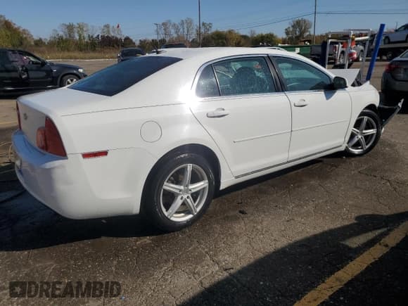 ✅ 2011 Chevrolet Malibu 1LT • VIN: 1G1ZC5E12BF328185 • Lot: 76472024. Listed on Copart with 77,563 mi. Free auction sales archive from the USA and detailed vehicle history report at DreamBid. Image 3.