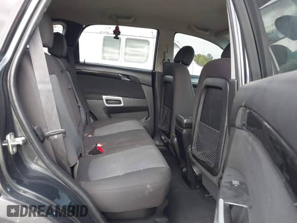 2015 Chevrolet Captiva Sport LS z VIN 3GNAL2EK8FS504113, wystawiony jako IAAI lot #43040886 z przebiegiem 176 003 mil mil oraz . Historia ofert i sprzedaży dostępna na DreamBid. Obrazek 8.